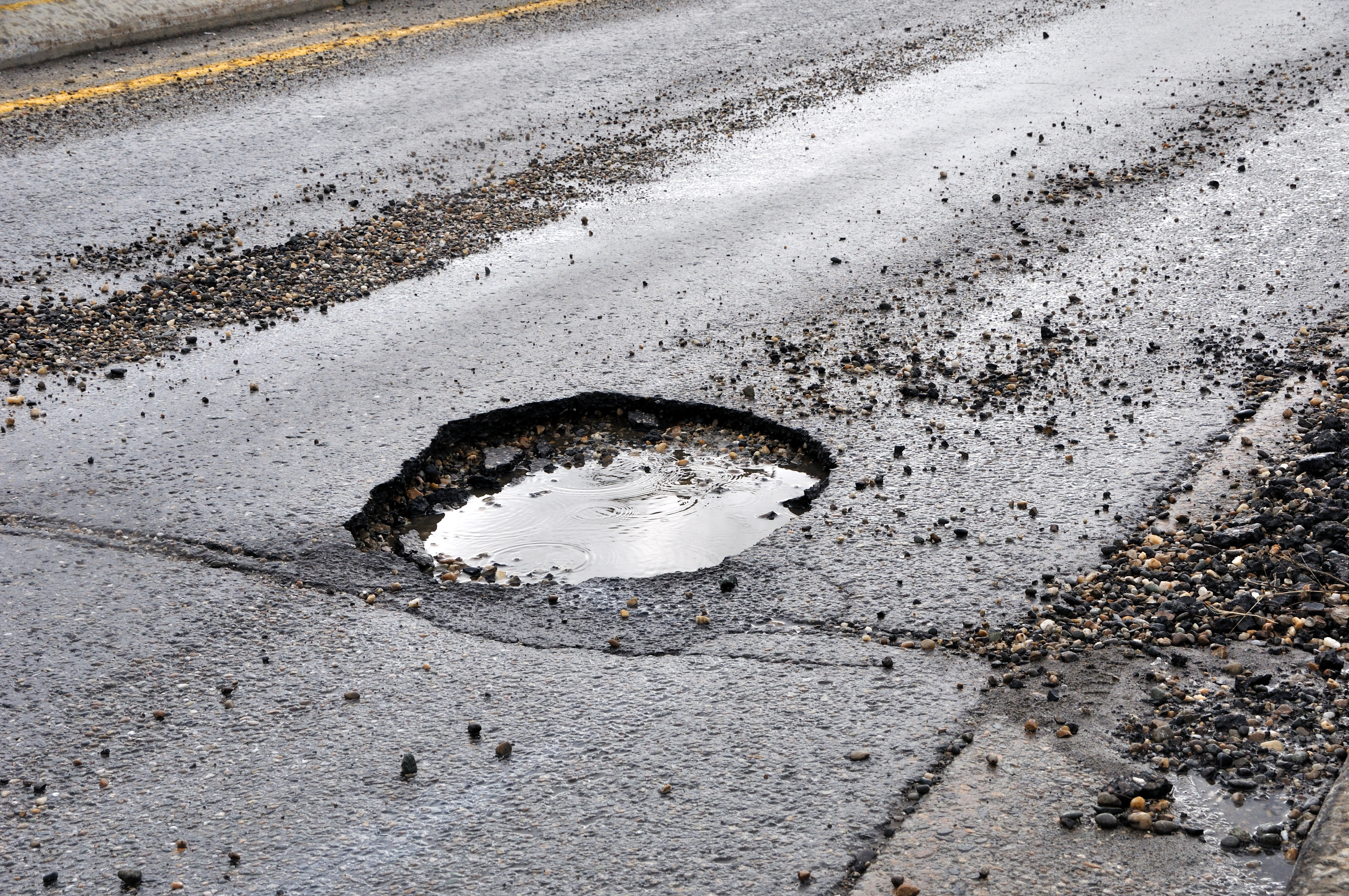 How Potholes Can Ruin More than Just Your Wheels